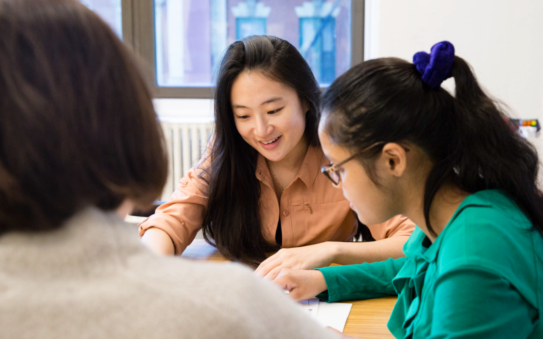 Undergraduate scholarship recipients, smiling and working together happily
